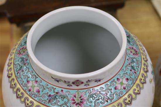 A Chinese famille rose vase and cover and a ceramic fountain vase height 35cm